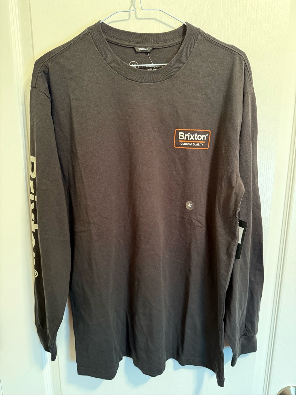 Brixton Men’s Black Long-Sleeve Logo Shirt with Orange Patch in Size M